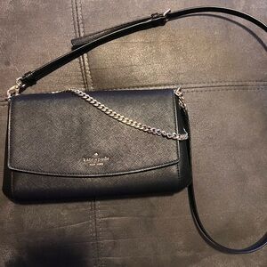 Kate Spade Black Crossbody Bag with Adjustable Strap and Gold Chain Detail